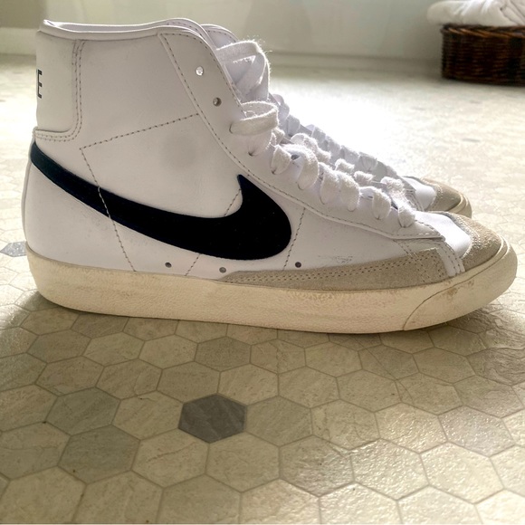 Nike Shoes - Selling these white high top Nike blazers! There clean and in perf condition!